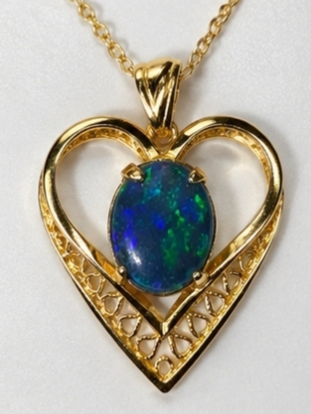 Vintage Heart shaped pendant 12k gf with blue and green flashy opal